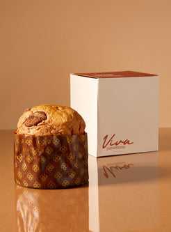Panettone Le Pomme d'épices entier devant sa boîte Viva panettone